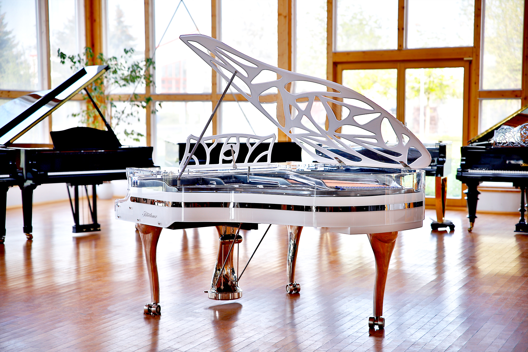 White Blüthner Crystal Hive Elegance Grand Piano with a titanium coloured iron frame
