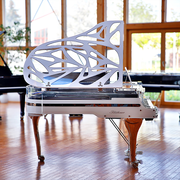 White Blüthner Crystal Hive Elegance Grand Piano with a titanium coloured iron frame